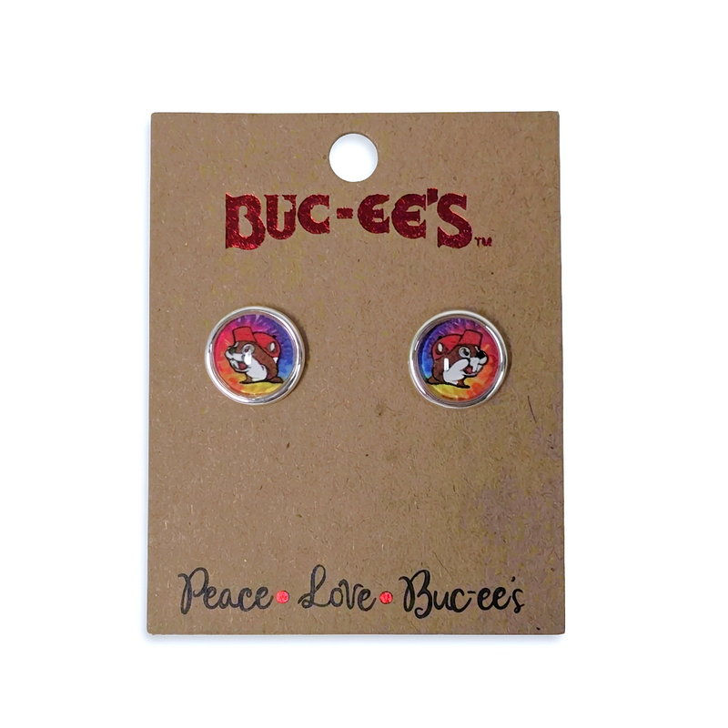 Buc-ee’s tie-dye bubble post earrings, round silver-tone studs with beaver mascot on a kraft paper display card
