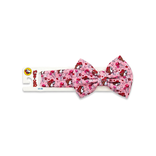 Buc-ee's pink Valentine's headband with a large bow, Buc-ee the Beaver, lollipop and heart print, on a hang card