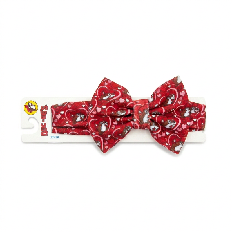 Buc-ee's red Valentine's headband with a large bow, Buc-ee the Beaver and pink heart print, on a hang card