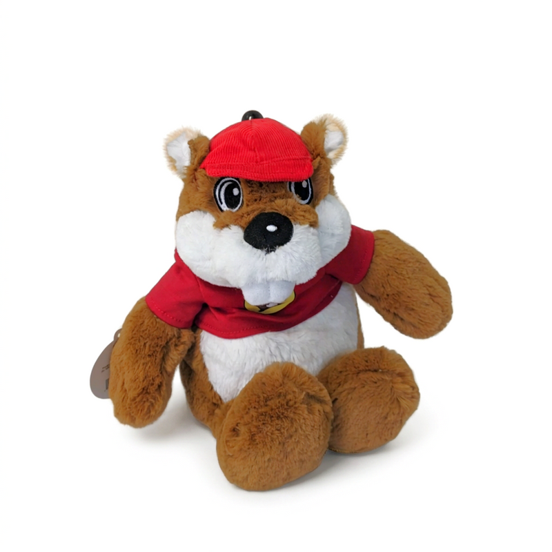 Buc-ee’s Warmy beaver plush with a red cap, red T-shirt, embroidered eyes and white buck teeth, sitting upright
