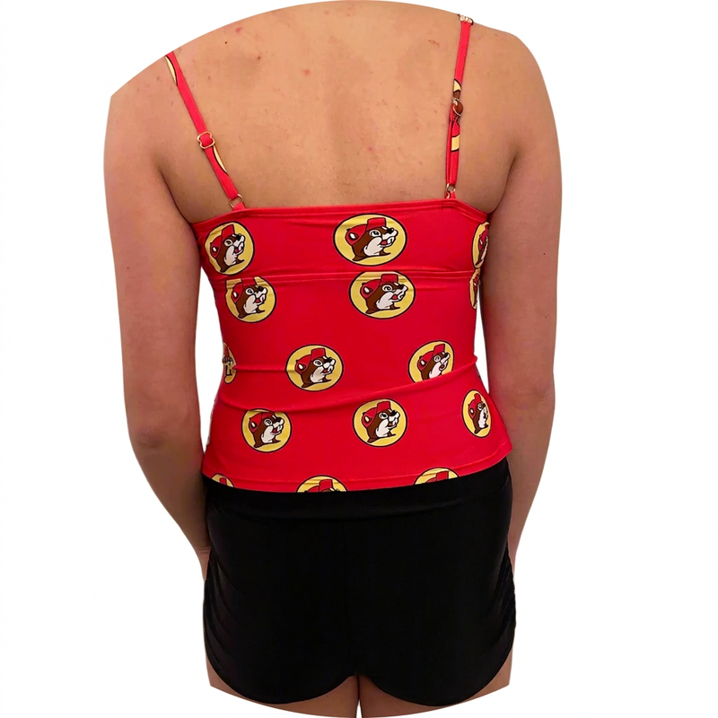 Buc-ee’s women’s red logo tankini top on a model, back view with thin adjustable straps and black swim shorts