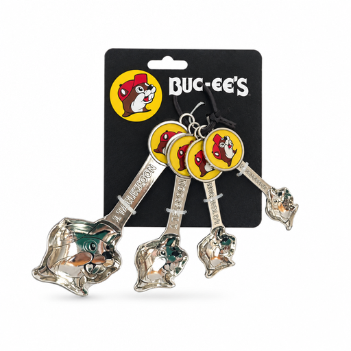 Buc-ee's zinc measuring spoon set of 4 with beaver-shaped bowls and yellow logo handles on a black display card