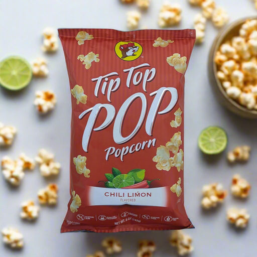 Buc-ee's Tip Top Pop Chili Limón Popcorn bag with popcorn and limes