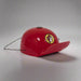 A single red reusable plastic party hat featuring the Buc-ee's logo, shown with a strap on a white background