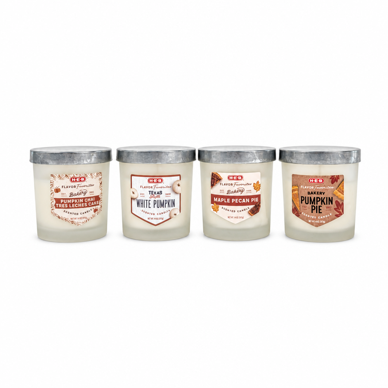 Four H-E-B Flavor Favorites fall scented candles: Pumpkin Chai Tres Leches, White Pumpkin, Maple Pecan Pie, Pumpkin Pie