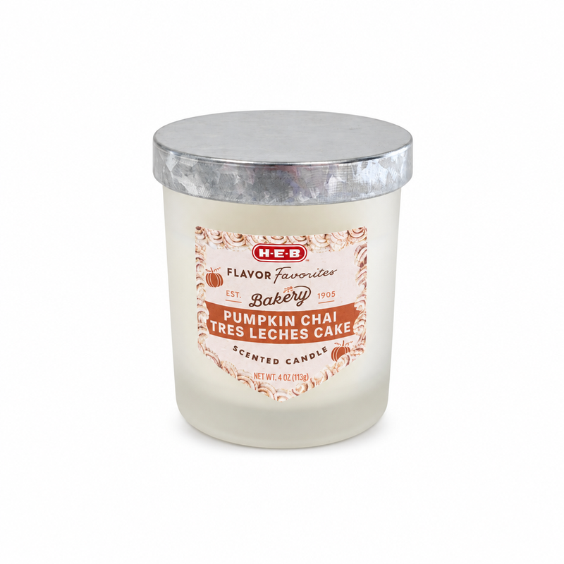 H-E-B Flavor Favorites Pumpkin Chai Tres Leches Cake scented candle, 4 oz, in a frosted glass jar with metal lid.