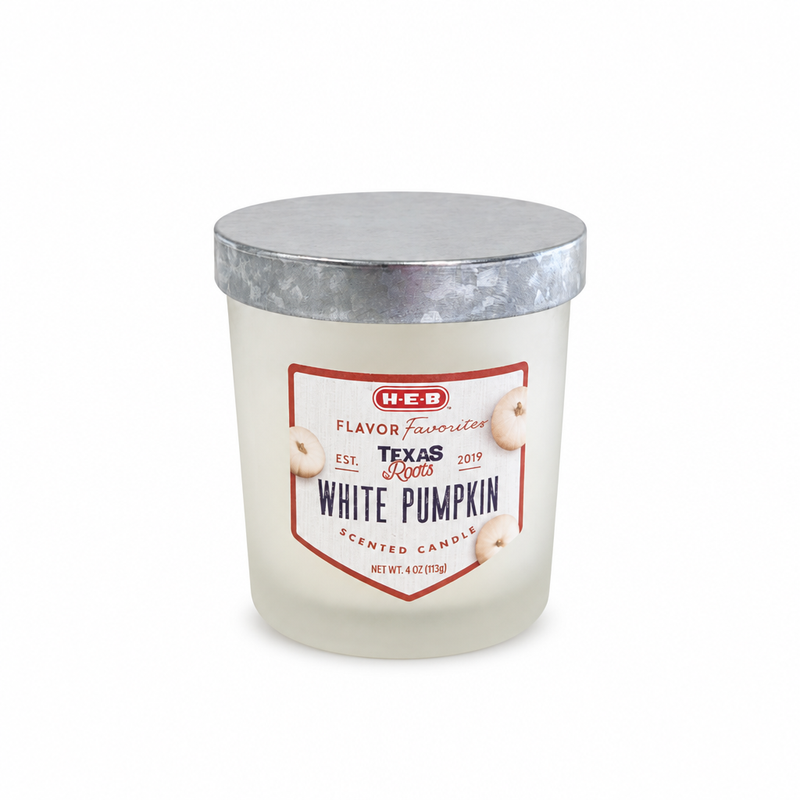 H-E-B Flavor Favorites Texas Roots White Pumpkin scented candle, 4 oz, in a frosted glass jar with a red-bordered label