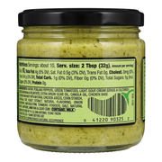 H-E-B That Green Sauce Medium in a glass jar, back label with ingredients, nutrition facts, and a milk allergen note