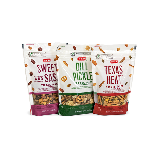 H-E-B Sweet and Sassy, Dill Pickle and Texas Heat trail mix pouches grouped together