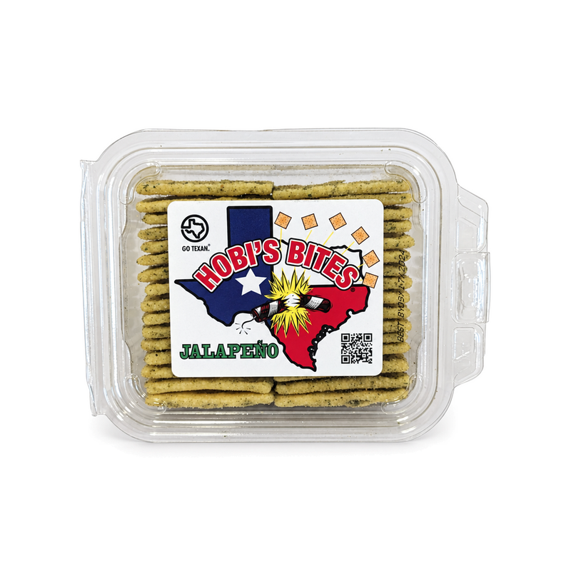 Hobi's Bites Jalapeño seasoned crackers in a clear clamshell container, top view