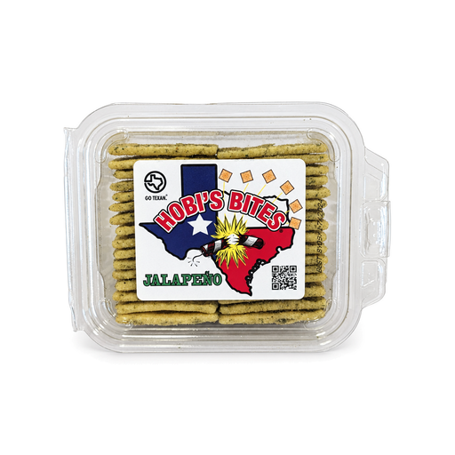 Hobi's Bites Jalapeño seasoned crackers in a clear clamshell container, top view