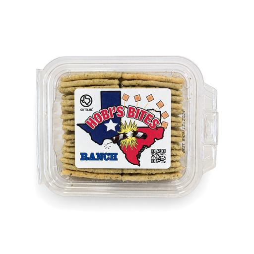 Hobi's Bites Ranch seasoned crackers in a clear clamshell container, top view