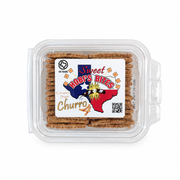 Hobi's Bites Sweet Churro cinnamon sugar crackers in a clear clamshell container, top view