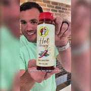 Buc-ee’s Hot Honey review featuring a taste test of raw, unfiltered honey with a chili kick in a 12 oz squeeze bottle, with serving suggestions for pizza, fried chicken, biscuits, and wings