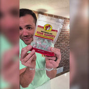 Buc-ee’s Watermelon Sour Gummies review and taste test featuring chewy watermelon-shaped candies with red centers, green rinds, and a sour sugar coating in an 8 oz bag