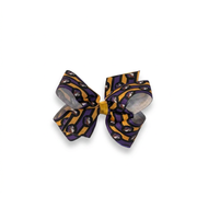 Buc-ee’s Halloween hair bow, small, with purple, orange and black stripes and a beaver mascot print