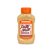 Whataburger Patty Melt Sauce in a squeeze bottle with orange cap and striped label