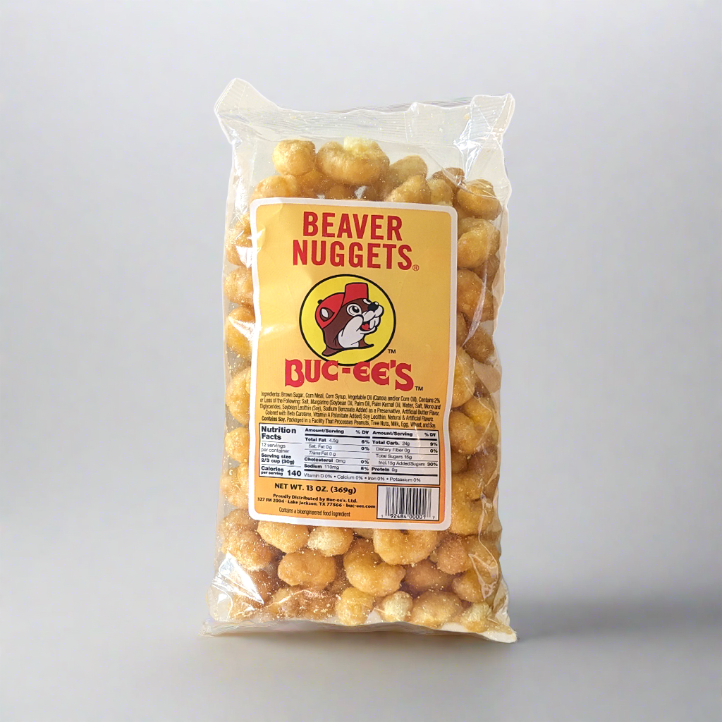 A pack of Buc-ee's Beaver Nuggets, a sweet corn puff snack, with the brand logo and product information displayed on the front.