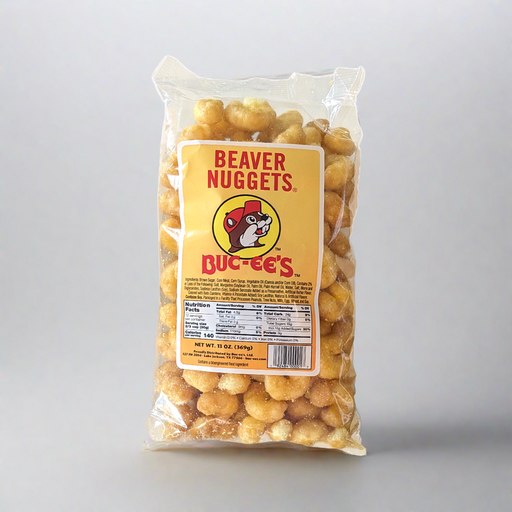 A pack of Buc-ee's Beaver Nuggets, a sweet corn puff snack, with the brand logo and product information displayed on the front.